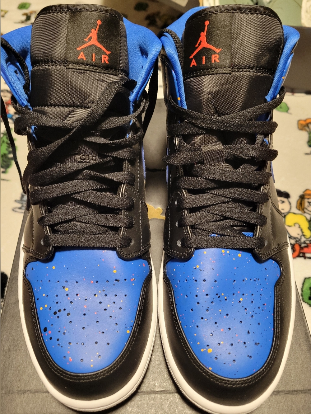 Jordan High-Top Sneakers in Black and Blue with Red Accent
